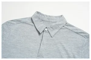 Close-up detail of grey men's polo shirt collar, breathable fabric, clean modern design.