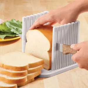 Plastic bread slicer guide for homemade toast and cake, adjustable cutting thickness.