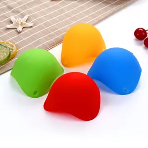 Colorful silicone egg boiler and mini kitchen cooking tool set for easy baking and boiling.
