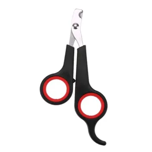 Detailed view of the pet nail clipper with sharp stainless steel blade and ergonomic red handle.