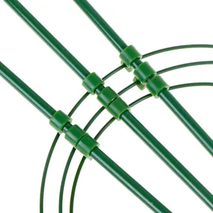 Close-up detail of green plant climbing support stake, plastic coated metal ring buckle structure.