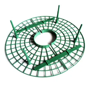 Green plastic strawberry support grid for garden, balcony vegetable planting and climbing plants.