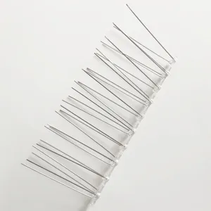 Punte anti-uccelli in acciaio inossidabile con base in plastica per tetti e giardini.