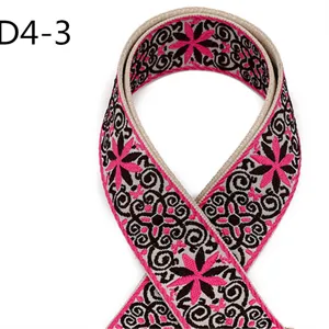 Close-up of 5cm ethnic jacquard webbing strap, pink floral pattern, high quality textile.