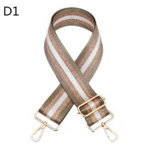 Detailed view of the adjustable replacement bag shoulder strap with metallic gold thread and hooks.