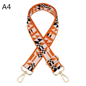 Close-up details of the colorful ethnic style replacement shoulder bag strap with golden hardware.