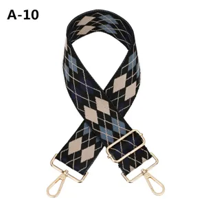 Wide woven replacement bag strap with classic diamond argyle pattern and gold metal hardware.
