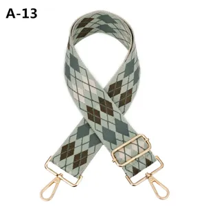 Wide argyle knit bag strap replacement adjustable shoulder strap with gold metal hardware.