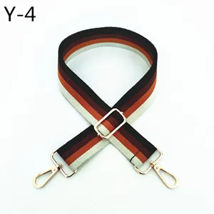 Colorful striped bag strap replacement with gold hardware, ethnic style wide strap accessory.