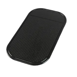 Silicone car anti-slip mat detail view, black dashboard sticky pad for phone and perfume.
