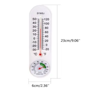Indoor wall mounted thermometer and hygrometer detail view showing dual temperature scales.