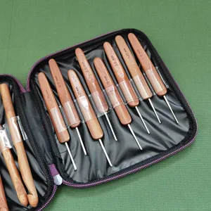 Bamboo handle crochet hook set with zippered case, various sizes for DIY knitting and crafting.