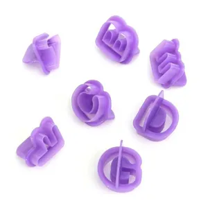 Purple plastic letter and number cookie cutters for fondant cake decorating and baking DIY.