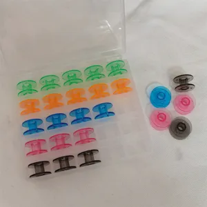 Juego de bobinas de plástico para máquina de coser multicolor con caja de almacenamiento.