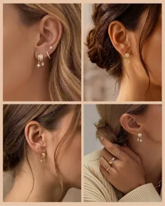 Gros plan détaillé de boucles d'oreilles asymétriques dorées élégantes aux accents étincelants.