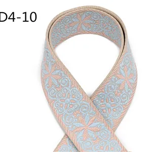Close-up of 5cm ethnic jacquard webbing featuring intricate pink and blue floral patterns.