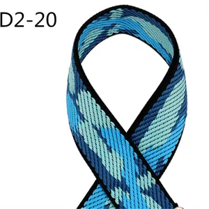 Detailed shot of 5cm wide blue camouflage jacquard webbing strap, showing texture and edge details.