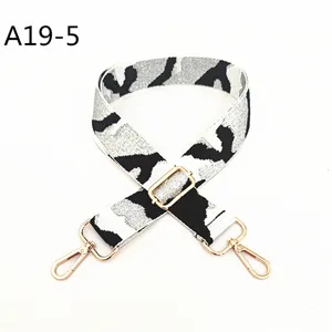 Replacement jacquard camouflage bag strap with adjustable gold metal hardware and hooks.