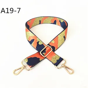 Camouflage jacquard bag strap detail, replacement shoulder strap with gold hardware.