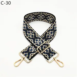 Ethnic style jacquard bag strap replacement, adjustable crossbody shoulder strap with gold hardware.
