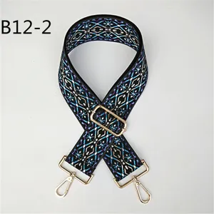 Ethnic jacquard wide replacement bag strap with adjustable gold metal hardware for crossbody.