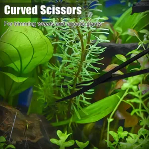 Detail shot of black curved aquascaping scissors trimming lush green aquarium plants underwater.