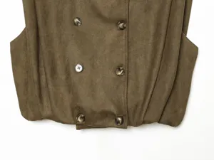 Detail shot of a women's vintage style double breasted suede vest in dark khaki color.