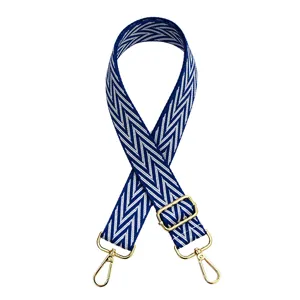 Blue and white chevron replacement bag strap with adjustable gold metal hardware and hooks.