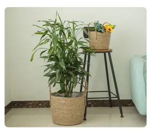 Handmade woven grass storage basket, natural plant pot holder for home indoor decor.