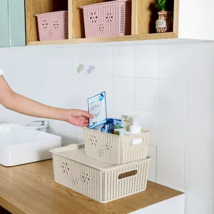 Panier de Rangement Tissé en Plastique avec Couvercle Organisateur de Bureau Boîte de Rangement Creuse Florale pour Jouets
