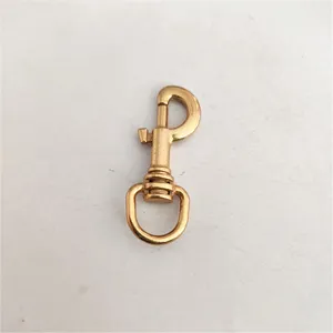 Gold metal lobster clasp detail shot, perfect for DIY bag hardware and accessories.