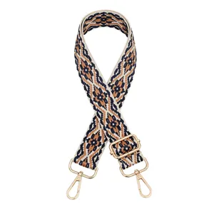 Woven ethnic style replacement handbag strap with adjustable gold hardware for crossbody bags.