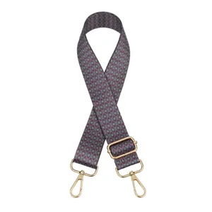 Replacement bag strap with ethnic geometric print, adjustable length and gold hardware.