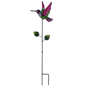 Close-up detail of the colorful hummingbird metal stake, perfect for garden and lawn decoration.