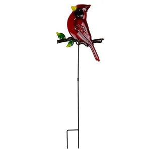 Metal red cardinal garden stake for outdoor lawn and yard decor with durable iron material.
