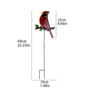 Metal cardinal garden stake detail showing height and width dimensions for outdoor lawn decor.