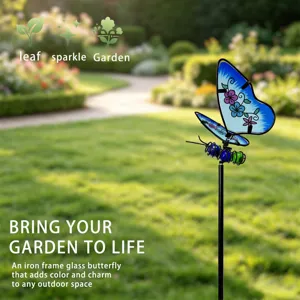 Detail shot of an iron and glass butterfly garden stake, perfect for outdoor yard decoration.