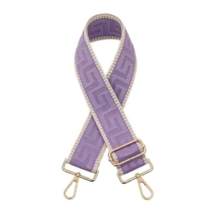 Sangle de sac de rechange géométrique violette et beige avec des accessoires dorés.