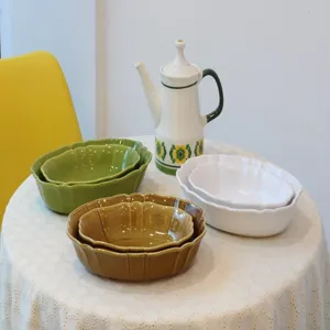 Retro Japanese ceramic oval baking dish set with vintage wavy lace design for kitchen food.