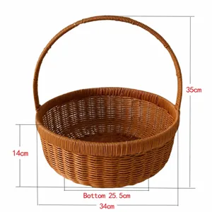 Detailed view of large brown plastic wicker picnic basket with sturdy handle for daily shopping.
