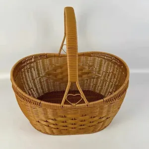 Wicker picnic basket for outdoor use, handy shopping storage container with single handle.
