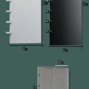 Close-up detail showing dimensions of mushroom hole binder covers and inner pages.