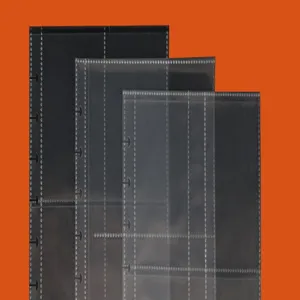 Close-up detail of transparent discbound photocard sleeves with mushroom holes for storage.