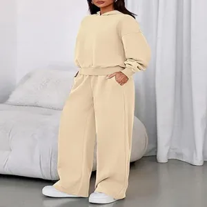 Casual women fleece lined solid color hoodie and wide leg sweatpants two piece set details.
