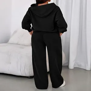 Detailed back view of casual women solid fleece hoodie and wide-leg sweatpants set.