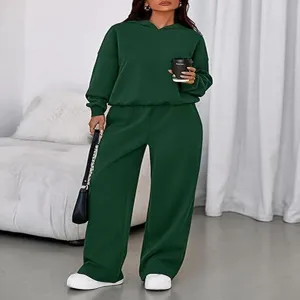 Green fleece-lined hooded sweatshirt wide-leg sweatpants two-piece set detail view.