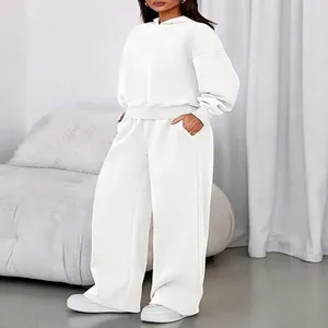 Detailed view of the women casual white fleece hooded sweatshirt and wide leg pants set.