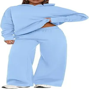 Women's casual solid color fleece-lined hoodie and wide leg sweatpants two piece set.