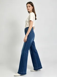 High waist dark wash flared denim jeans with raw fringe hem. Stylish casual daily wear.