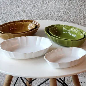 Vintage Japanese wavy ceramic oval baking dish, deep plate for curry, rice, salad, or oven use.